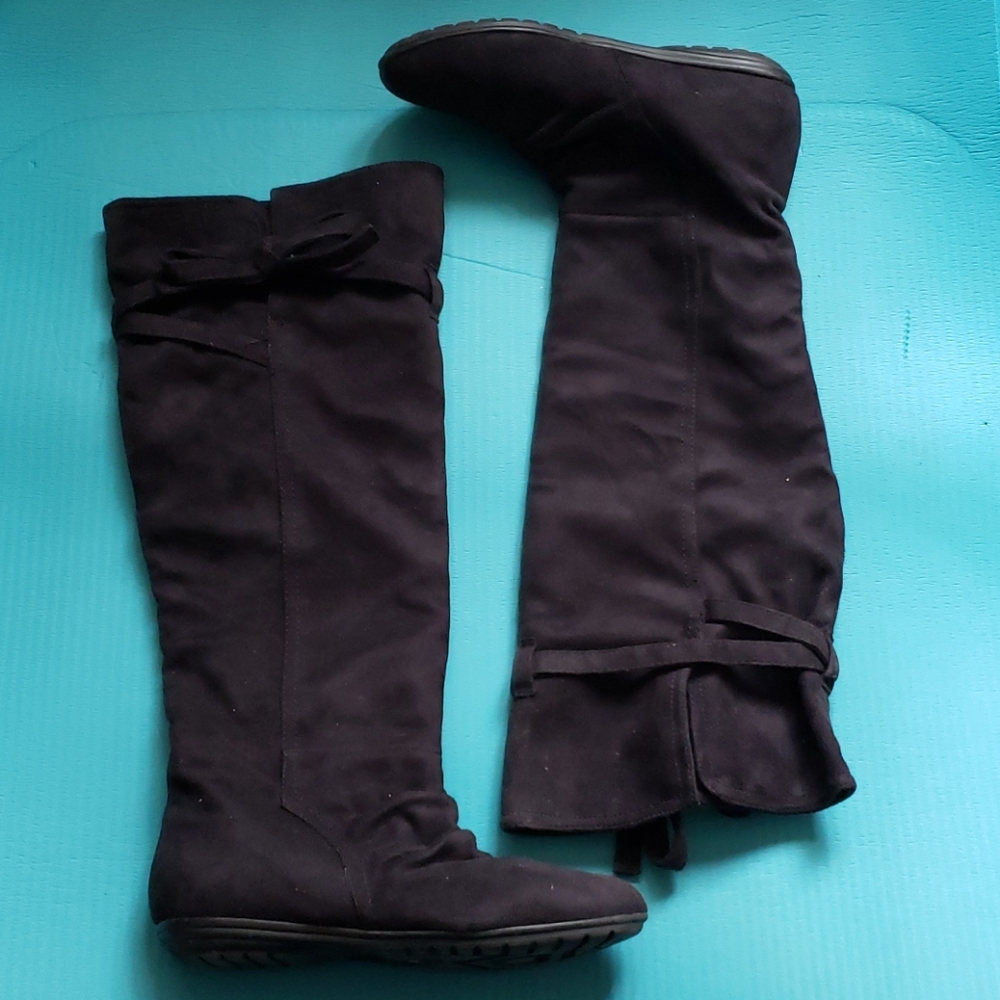 Report black knee-high boots